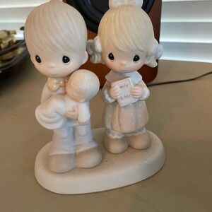 Adorable Figurine Set with Children and Baby